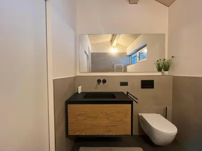Ein Badezimmer in der Unterkunft River Lodge