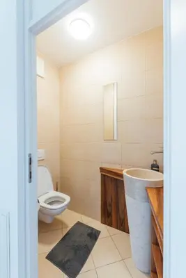 Ein Badezimmer in der Unterkunft Cocoon am See