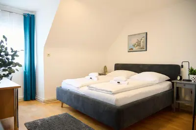Ein Bett oder Betten in einem Zimmer der Unterkunft Zentrales Apartment Pfänderblick