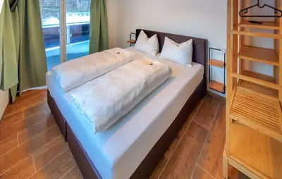 Ein Bett oder Betten in einem Zimmer der Unterkunft Arlberg-Schmiede