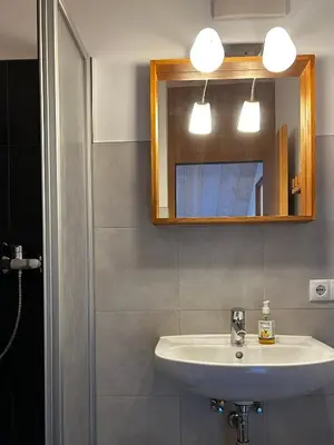 Ein Badezimmer in der Unterkunft WÄLDERHAUS Apartments