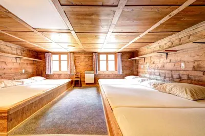 Ein Bett oder Betten in einem Zimmer der Unterkunft Pfefferhütte