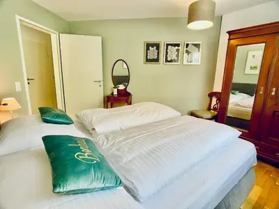 Ein Bett oder Betten in einem Zimmer der Unterkunft Stilvolles Apartment «Coco» am Bodensee