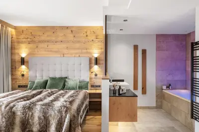 Ein Bett oder Betten in einem Zimmer der Unterkunft Lech Valley Lodge