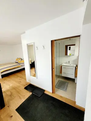 Ein Bett oder Betten in einem Zimmer der Unterkunft Apartment Sonnenschein