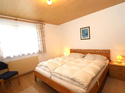 Ein Bett oder Betten in einem Zimmer der Unterkunft Apartment Heidi