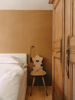 Ein Bett oder Betten in einem Zimmer der Unterkunft Sandbur Das Walserhaus