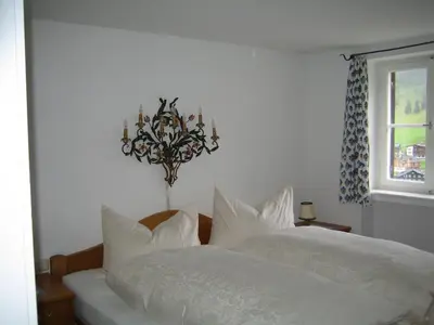 Ein Bett oder Betten in einem Zimmer der Unterkunft Haus Dr. Küng