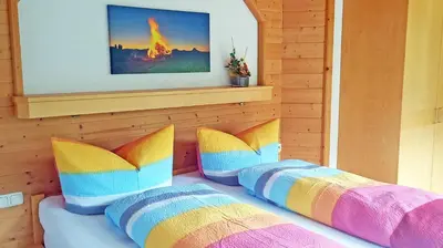 Ein Bett oder Betten in einem Zimmer der Unterkunft Appartements Garni Drei Wannen