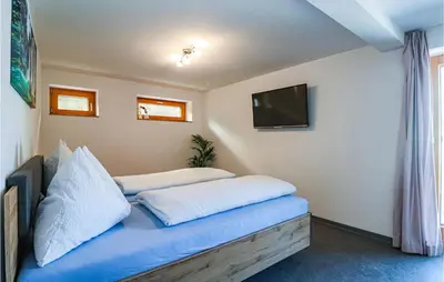 Ein Bett oder Betten in einem Zimmer der Unterkunft Ferienwohnung Sonntag