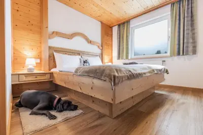 Ein Bett oder Betten in einem Zimmer der Unterkunft Haus Schrofenwies