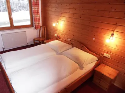 Ein Bett oder Betten in einem Zimmer der Unterkunft Haus Konzett