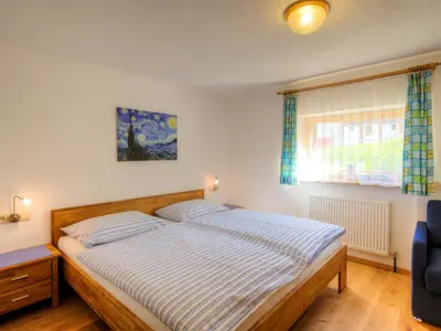 Ein Bett oder Betten in einem Zimmer der Unterkunft Haus Ricarda