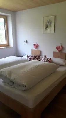 Ein Bett oder Betten in einem Zimmer der Unterkunft Haus Katharina