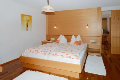 Ein Bett oder Betten in einem Zimmer der Unterkunft Fernblick Frühstückspension