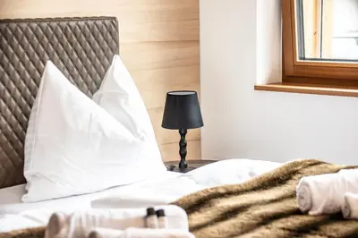 Ein Bett oder Betten in einem Zimmer der Unterkunft Huus123