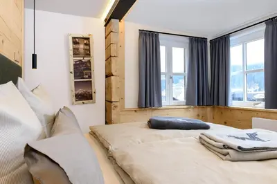 Ein Bett oder Betten in einem Zimmer der Unterkunft Hoheneck Apartment