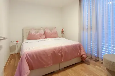 Ein Bett oder Betten in einem Zimmer der Unterkunft Wohlfühlapartments in Hard