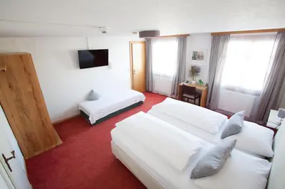 Ein Bett oder Betten in einem Zimmer der Unterkunft Wellenhof Bodensee