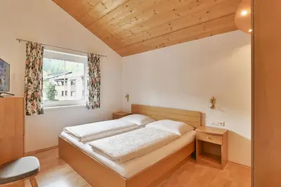 Ein Bett oder Betten in einem Zimmer der Unterkunft Apartmenthaus Steiner