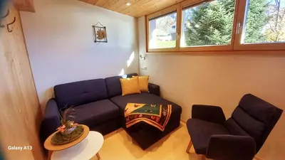 Ein Sitzbereich in der Unterkunft Haus Simma