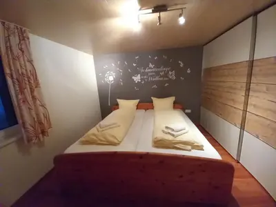 Ein Bett oder Betten in einem Zimmer der Unterkunft Ferienwohnung an der Alfenz