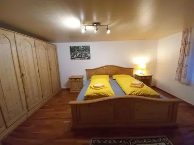 Ein Bett oder Betten in einem Zimmer der Unterkunft Ferienwohnung an der Alfenz