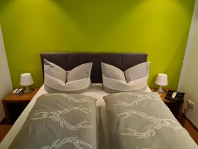Ein Bett oder Betten in einem Zimmer der Unterkunft Ammann Marika
