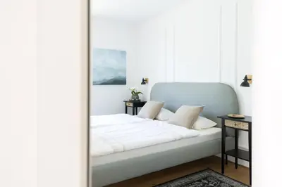 Ein Bett oder Betten in einem Zimmer der Unterkunft Ferienwohnung Rosenstrasse
