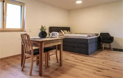 Ein Bett oder Betten in einem Zimmer der Unterkunft Ferienwohnung In Braz