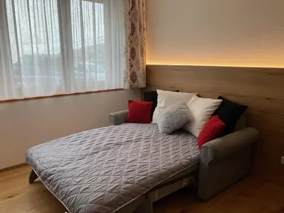 Ein Bett oder Betten in einem Zimmer der Unterkunft Berg Aparts Faschina Top 7