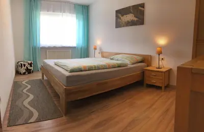 Ein Bett oder Betten in einem Zimmer der Unterkunft Walli Laterns - Ski und Bergvergnügen direkt vor der Haustür