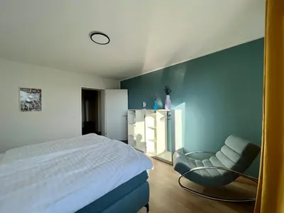 Ein Bett oder Betten in einem Zimmer der Unterkunft Apartment Popular