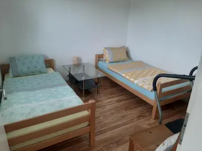 Ein Bett oder Betten in einem Zimmer der Unterkunft Wohnung Rheintal im Alpenvorland
