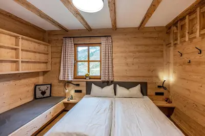 Ein Bett oder Betten in einem Zimmer der Unterkunft Pfefferkornhütte