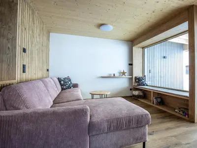 Ein Sitzbereich in der Unterkunft Kracha Alpinlodge