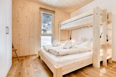 Ein Bett oder Betten in einem Zimmer der Unterkunft Ferienwohnung Family Plus zentral by A-Appartments