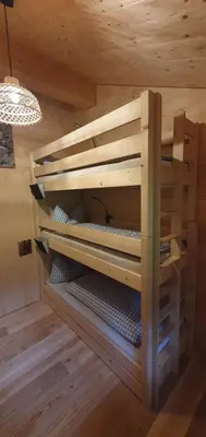 Ein Etagenbett oder Etagenbetten in einem Zimmer der Unterkunft Hirschberghütte