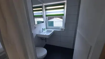 Ein Badezimmer in der Unterkunft Green Hill Rooms