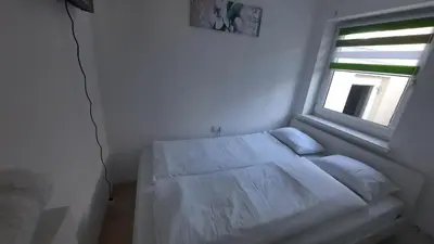 Ein Bett oder Betten in einem Zimmer der Unterkunft Green Hill Rooms