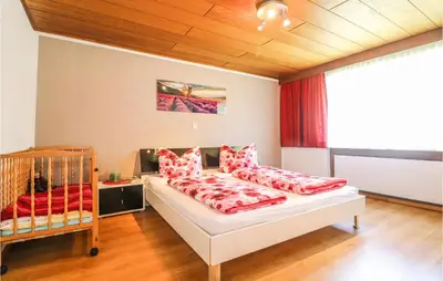 Ein Bett oder Betten in einem Zimmer der Unterkunft Gemuetliche Ferienwohnung