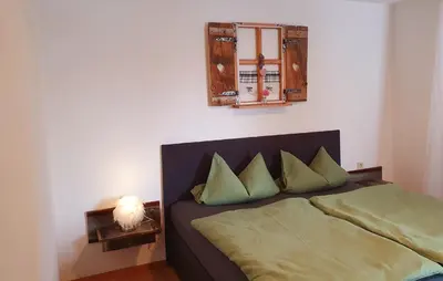 Ein Bett oder Betten in einem Zimmer der Unterkunft Bergjuwel Kleinwalsertal
