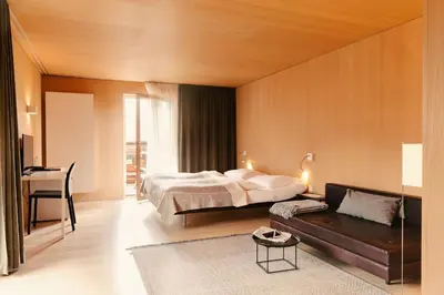 Ein Bett oder Betten in einem Zimmer der Unterkunft Hotel Post Bezau