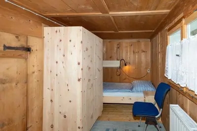 Ein Bett oder Betten in einem Zimmer der Unterkunft Haus Holzwurm