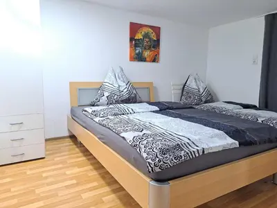 Ein Bett oder Betten in einem Zimmer der Unterkunft ZADRA Home