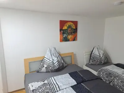 Ein Bett oder Betten in einem Zimmer der Unterkunft ZADRA Home