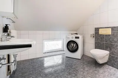 Ein Badezimmer in der Unterkunft homy Alpenlodge
