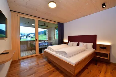 Ein Bett oder Betten in einem Zimmer der Unterkunft Straußberghof